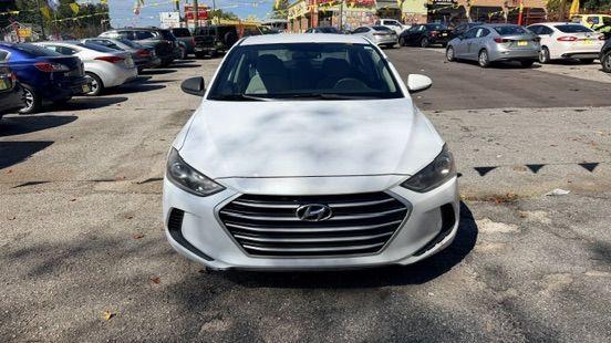 2017 White Hyundai Elantra SE 6AT (5NPD74LF3HH) with an 1.8L L4 DOHC 16V engine, 6-Speed Automatic transmission, located at 1806 Veterans Memorial Hwy SW, Austell, GA, 30168, (770) 944-9558, 33.817959, -84.606987 - Photo#1