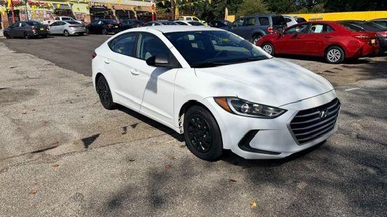 2017 White Hyundai Elantra SE 6AT (5NPD74LF3HH) with an 1.8L L4 DOHC 16V engine, 6-Speed Automatic transmission, located at 1806 Veterans Memorial Hwy SW, Austell, GA, 30168, (770) 944-9558, 33.817959, -84.606987 - Photo#2