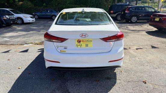 2017 White Hyundai Elantra SE 6AT (5NPD74LF3HH) with an 1.8L L4 DOHC 16V engine, 6-Speed Automatic transmission, located at 1806 Veterans Memorial Hwy SW, Austell, GA, 30168, (770) 944-9558, 33.817959, -84.606987 - Photo#4