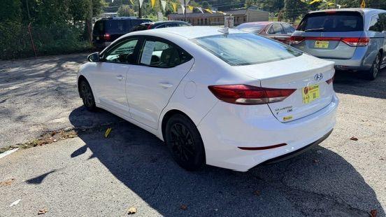 2017 White Hyundai Elantra SE 6AT (5NPD74LF3HH) with an 1.8L L4 DOHC 16V engine, 6-Speed Automatic transmission, located at 1806 Veterans Memorial Hwy SW, Austell, GA, 30168, (770) 944-9558, 33.817959, -84.606987 - Photo#5