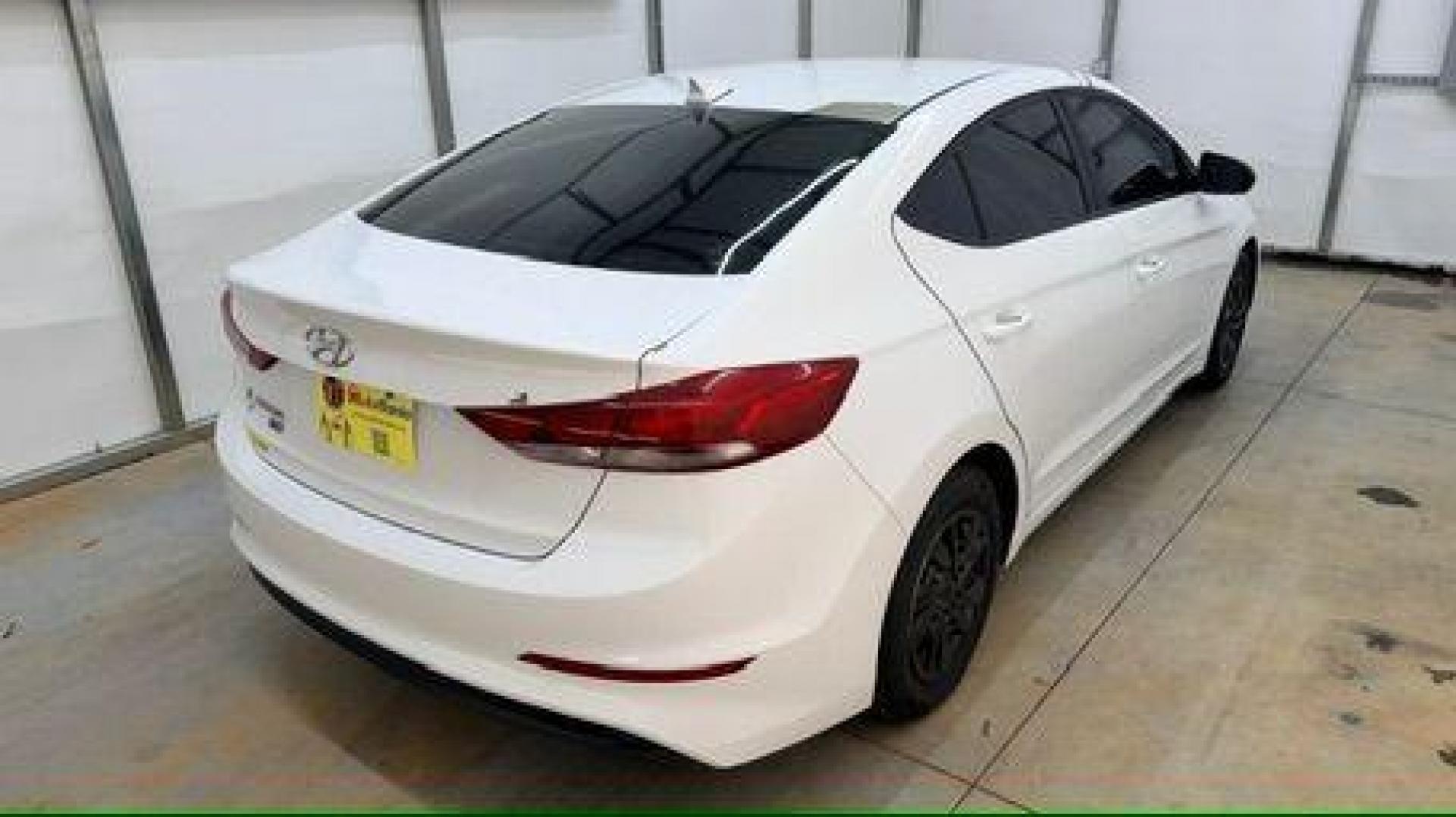 2017 White Hyundai Elantra SE 6AT (5NPD74LF3HH) with an 1.8L L4 DOHC 16V engine, 6-Speed Automatic transmission, located at 1806 Veterans Memorial Hwy SW, Austell, GA, 30168, (770) 944-9558, 33.817959, -84.606987 - Photo#5