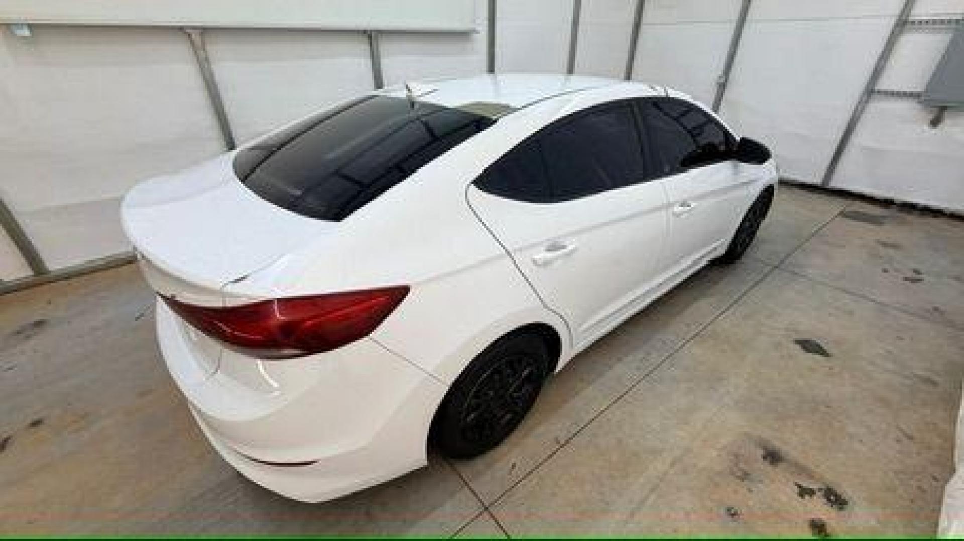 2017 White Hyundai Elantra SE 6AT (5NPD74LF3HH) with an 1.8L L4 DOHC 16V engine, 6-Speed Automatic transmission, located at 1806 Veterans Memorial Hwy SW, Austell, GA, 30168, (770) 944-9558, 33.817959, -84.606987 - Photo#6