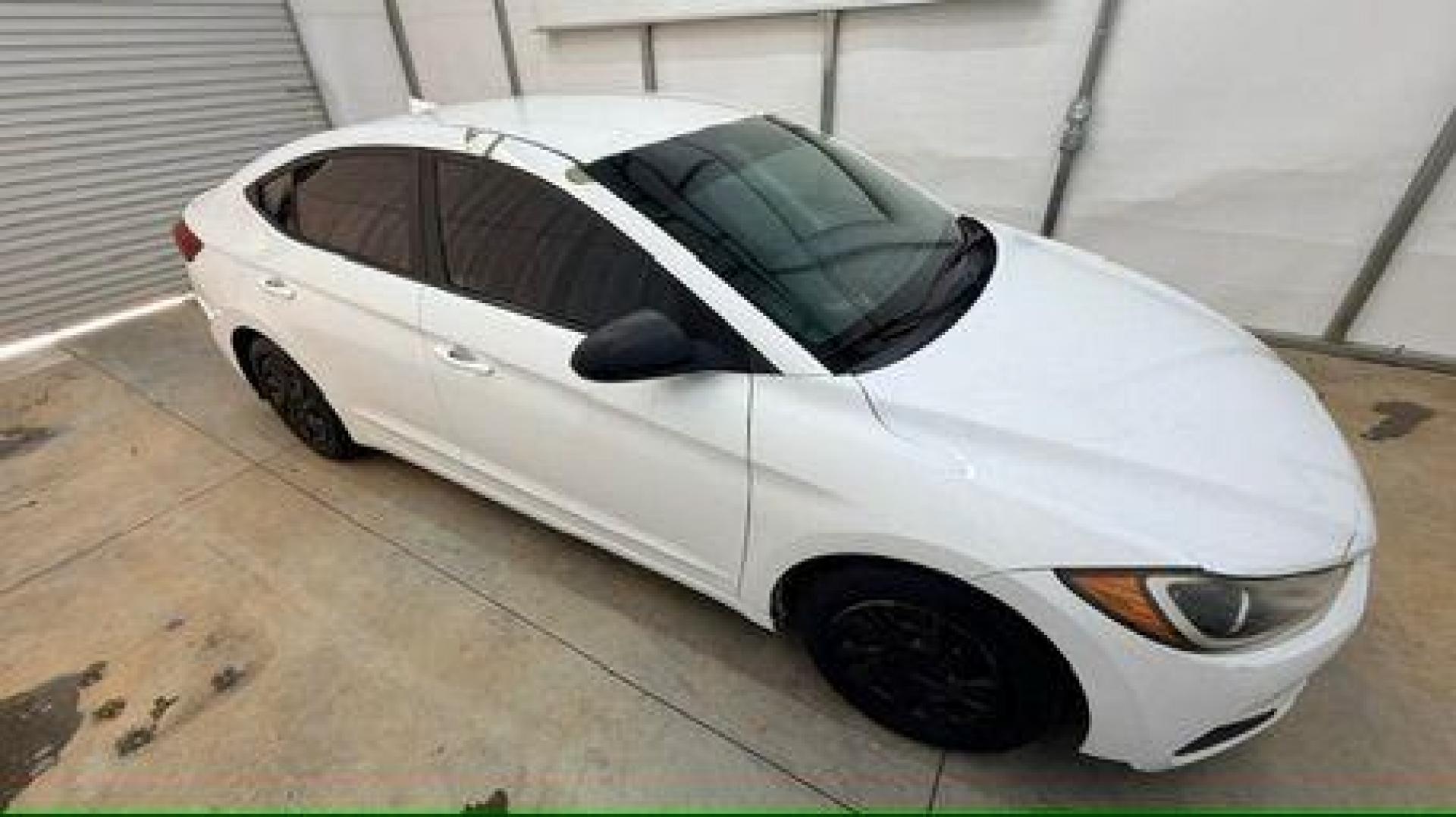 2017 White Hyundai Elantra SE 6AT (5NPD74LF3HH) with an 1.8L L4 DOHC 16V engine, 6-Speed Automatic transmission, located at 1806 Veterans Memorial Hwy SW, Austell, GA, 30168, (770) 944-9558, 33.817959, -84.606987 - Photo#7