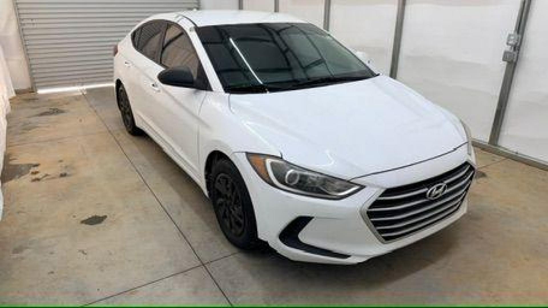2017 White Hyundai Elantra SE 6AT (5NPD74LF3HH) with an 1.8L L4 DOHC 16V engine, 6-Speed Automatic transmission, located at 1806 Veterans Memorial Hwy SW, Austell, GA, 30168, (770) 944-9558, 33.817959, -84.606987 - Photo#8