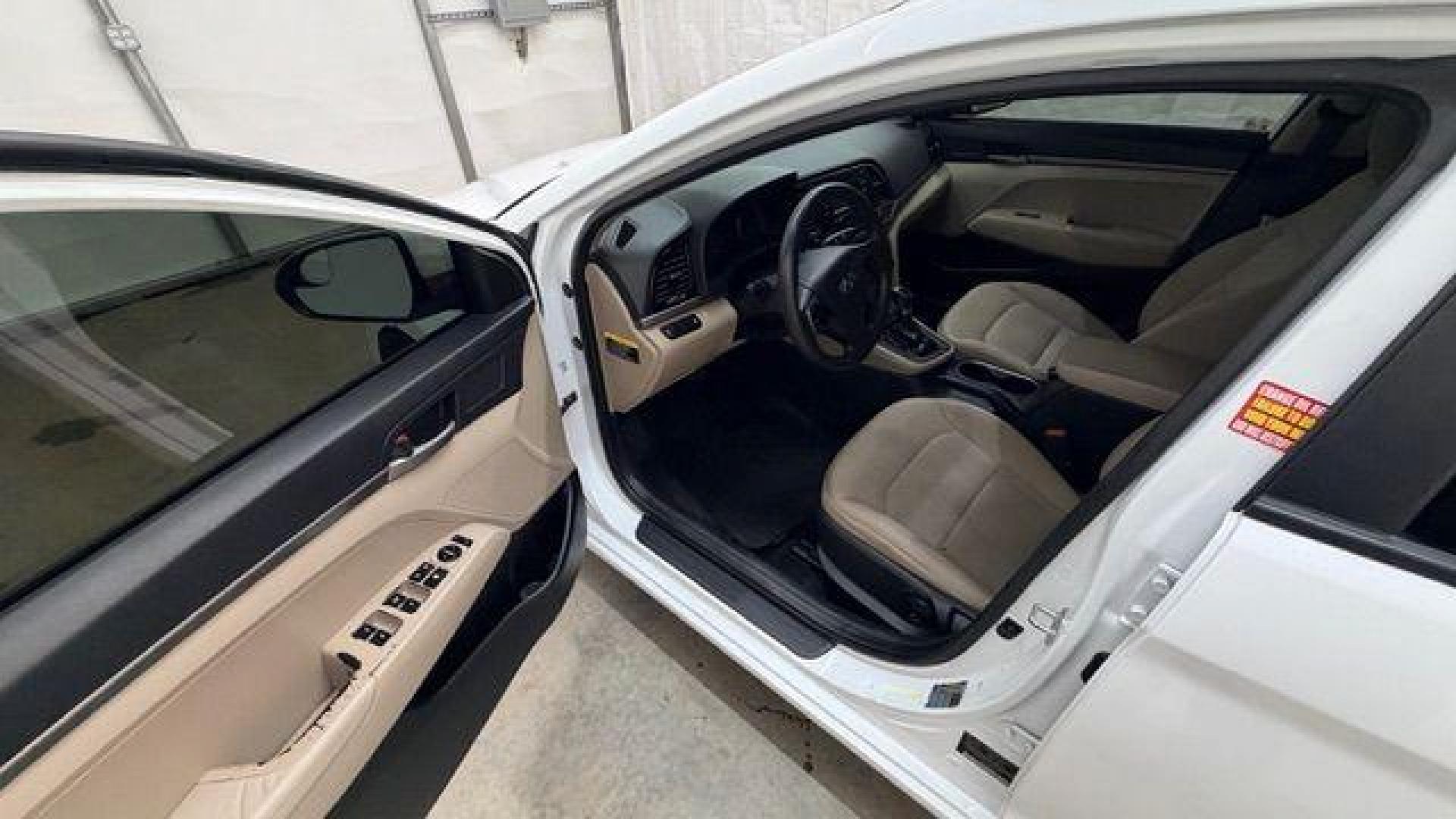 2017 White Hyundai Elantra SE 6AT (5NPD74LF3HH) with an 1.8L L4 DOHC 16V engine, 6-Speed Automatic transmission, located at 1806 Veterans Memorial Hwy SW, Austell, GA, 30168, (770) 944-9558, 33.817959, -84.606987 - Photo#11