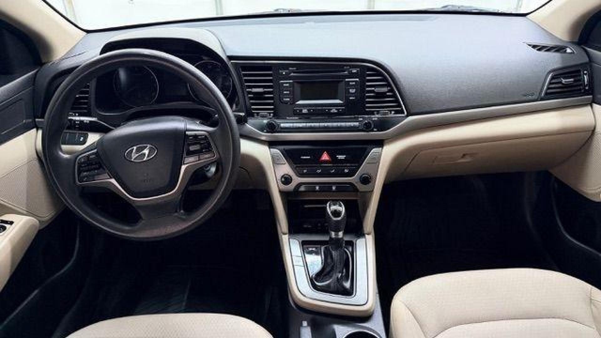 2017 White Hyundai Elantra SE 6AT (5NPD74LF3HH) with an 1.8L L4 DOHC 16V engine, 6-Speed Automatic transmission, located at 1806 Veterans Memorial Hwy SW, Austell, GA, 30168, (770) 944-9558, 33.817959, -84.606987 - Photo#15