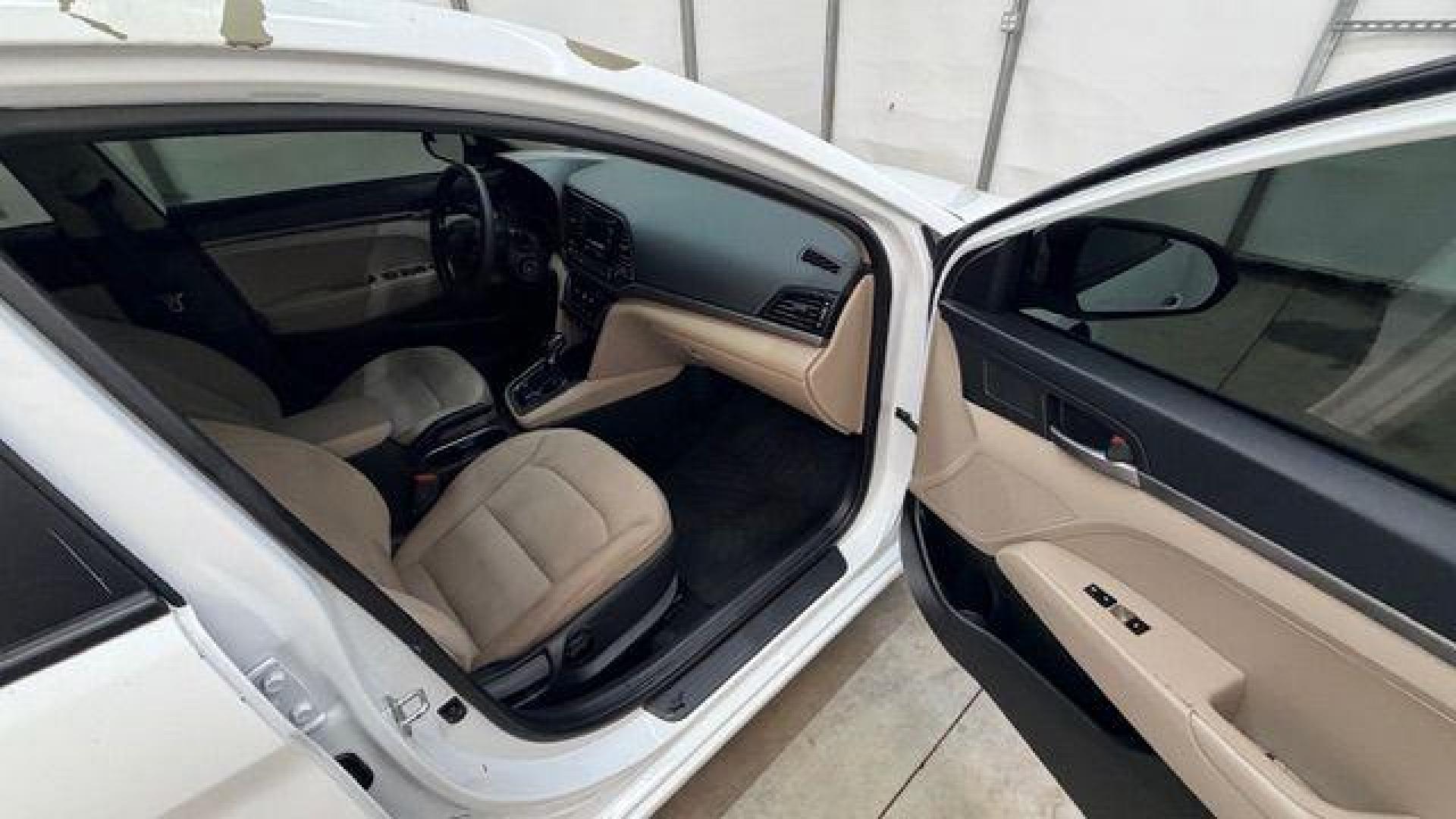 2017 White Hyundai Elantra SE 6AT (5NPD74LF3HH) with an 1.8L L4 DOHC 16V engine, 6-Speed Automatic transmission, located at 1806 Veterans Memorial Hwy SW, Austell, GA, 30168, (770) 944-9558, 33.817959, -84.606987 - Photo#19