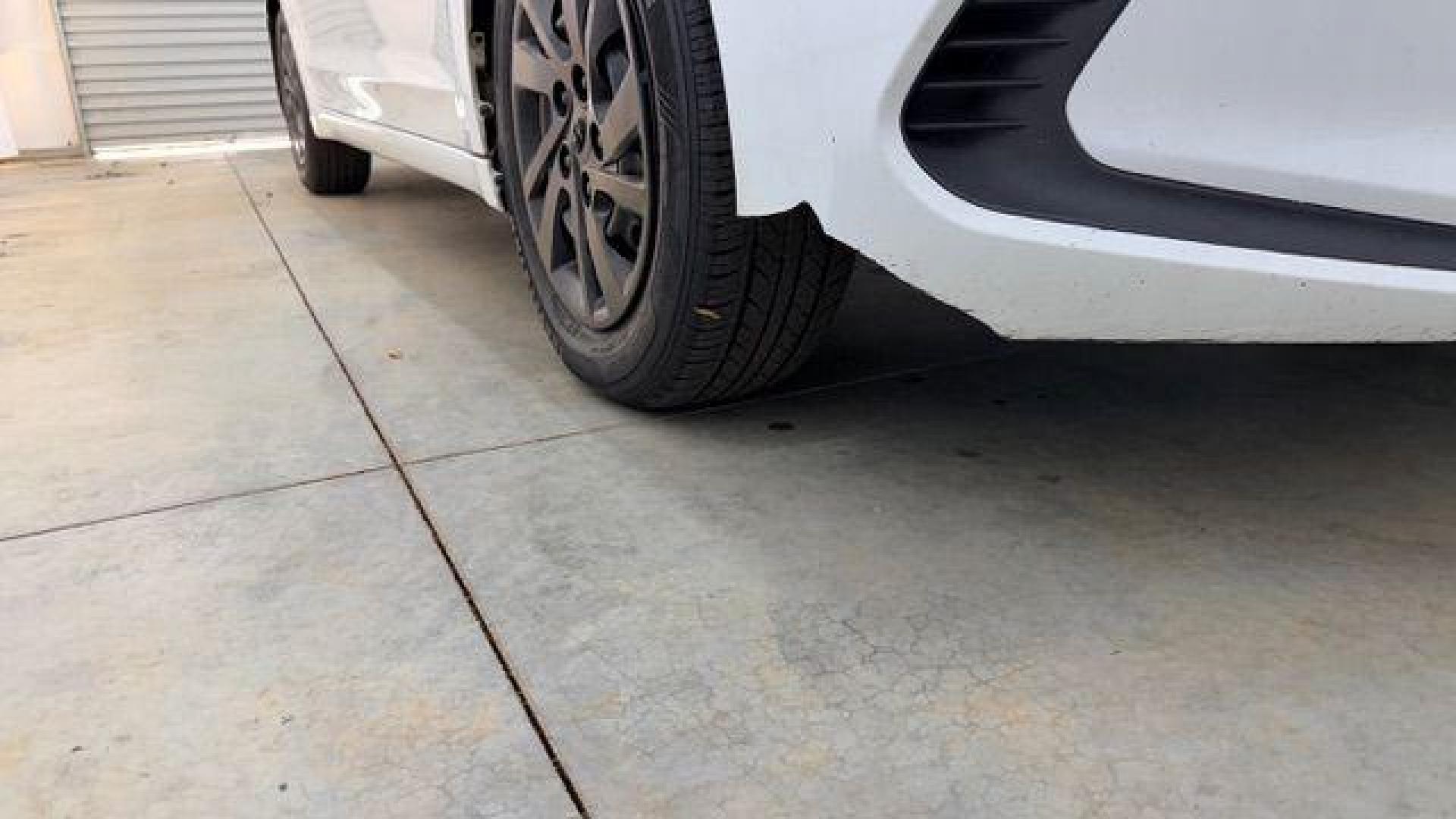 2017 White Hyundai Elantra SE 6AT (5NPD74LF3HH) with an 1.8L L4 DOHC 16V engine, 6-Speed Automatic transmission, located at 1806 Veterans Memorial Hwy SW, Austell, GA, 30168, (770) 944-9558, 33.817959, -84.606987 - Photo#21