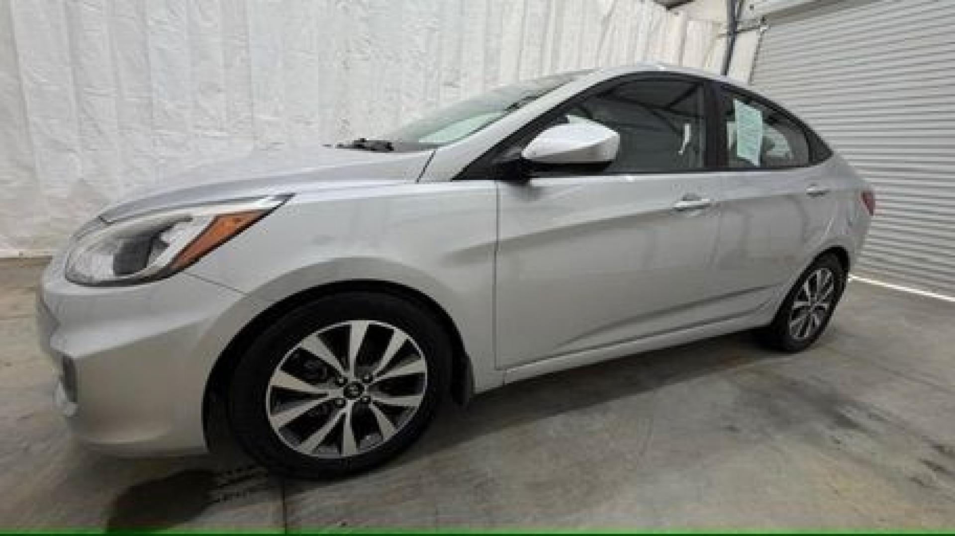 2017 Silver Hyundai Accent SE 4-Door 6A (KMHCT4AEXHU) with an 1.6L L4 DOHC 16V engine, 6-Speed Automatic transmission, located at 1806 Veterans Memorial Hwy SW, Austell, GA, 30168, (770) 944-9558, 33.817959, -84.606987- Photo#1