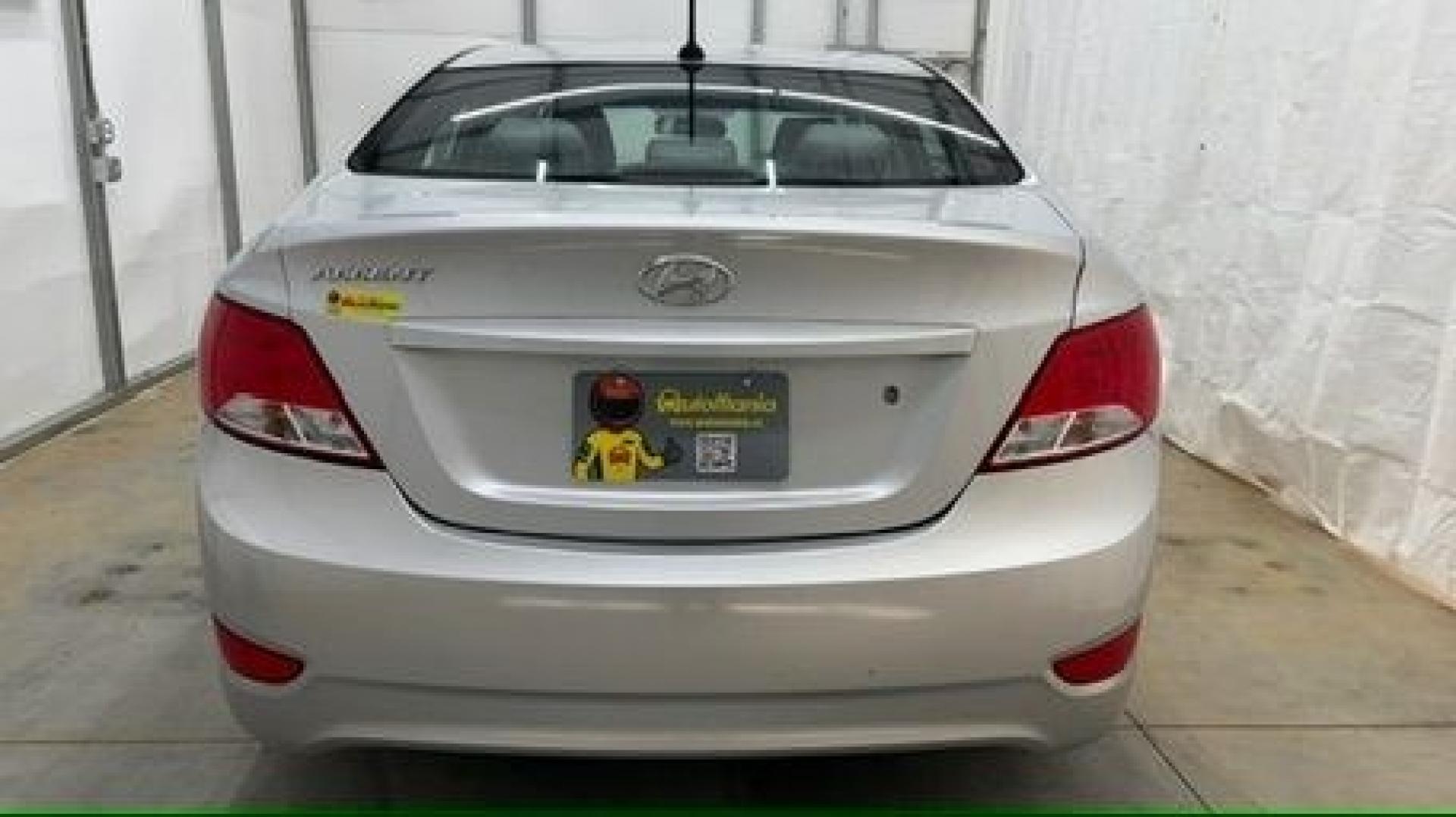 2017 Silver Hyundai Accent SE 4-Door 6A (KMHCT4AEXHU) with an 1.6L L4 DOHC 16V engine, 6-Speed Automatic transmission, located at 1806 Veterans Memorial Hwy SW, Austell, GA, 30168, (770) 944-9558, 33.817959, -84.606987- Photo#4