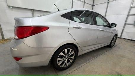2017 Silver Hyundai Accent SE 4-Door 6A (KMHCT4AEXHU) with an 1.6L L4 DOHC 16V engine, 6-Speed Automatic transmission, located at 1806 Veterans Memorial Hwy SW, Austell, GA, 30168, (770) 944-9558, 33.817959, -84.606987 - Photo#6