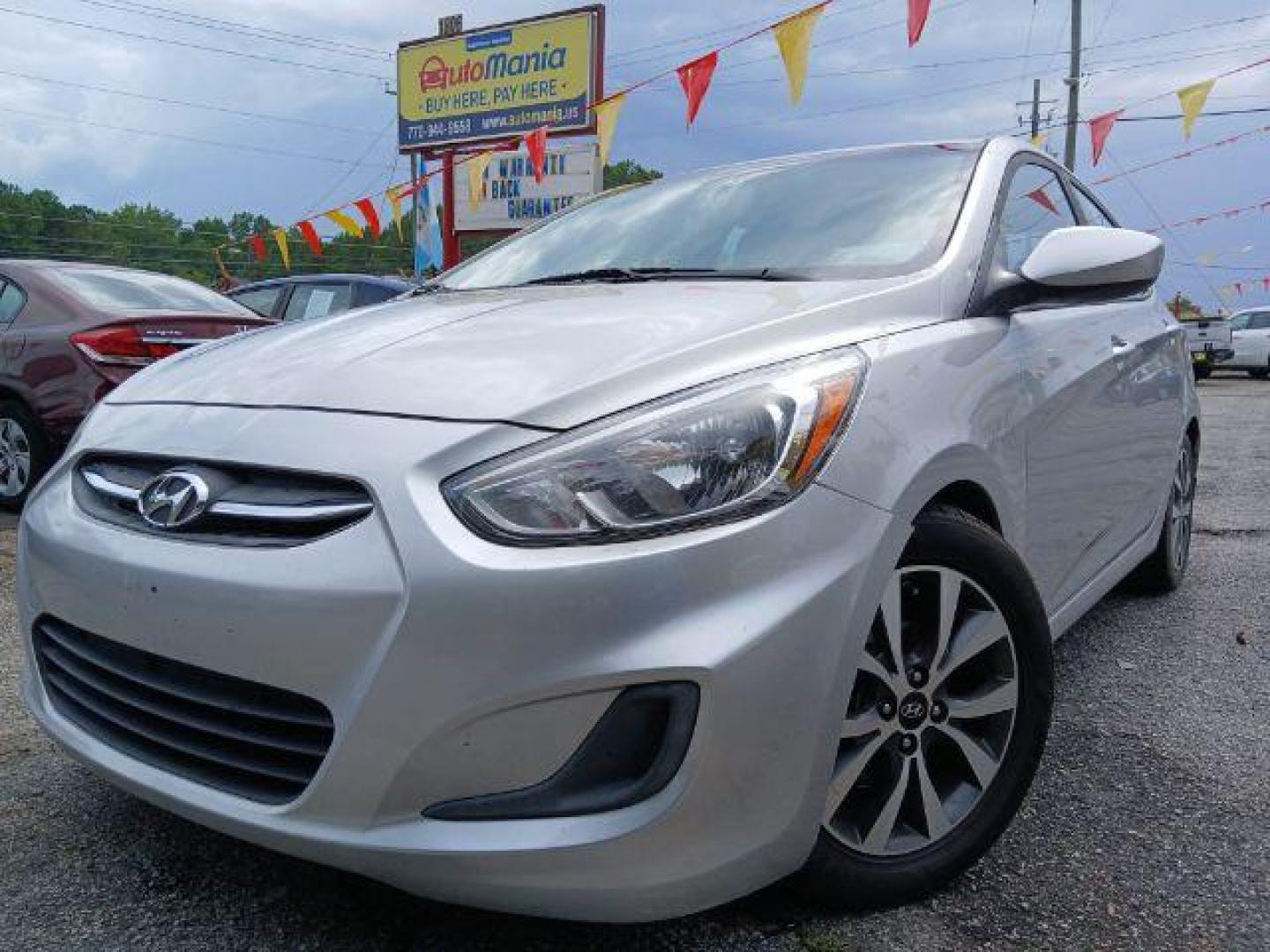 2017 Silver Hyundai Accent SE 4-Door 6A (KMHCT4AEXHU) with an 1.6L L4 DOHC 16V engine, 6-Speed Automatic transmission, located at 1806 Veterans Memorial Hwy SW, Austell, GA, 30168, (770) 944-9558, 33.817959, -84.606987 - Photo#0