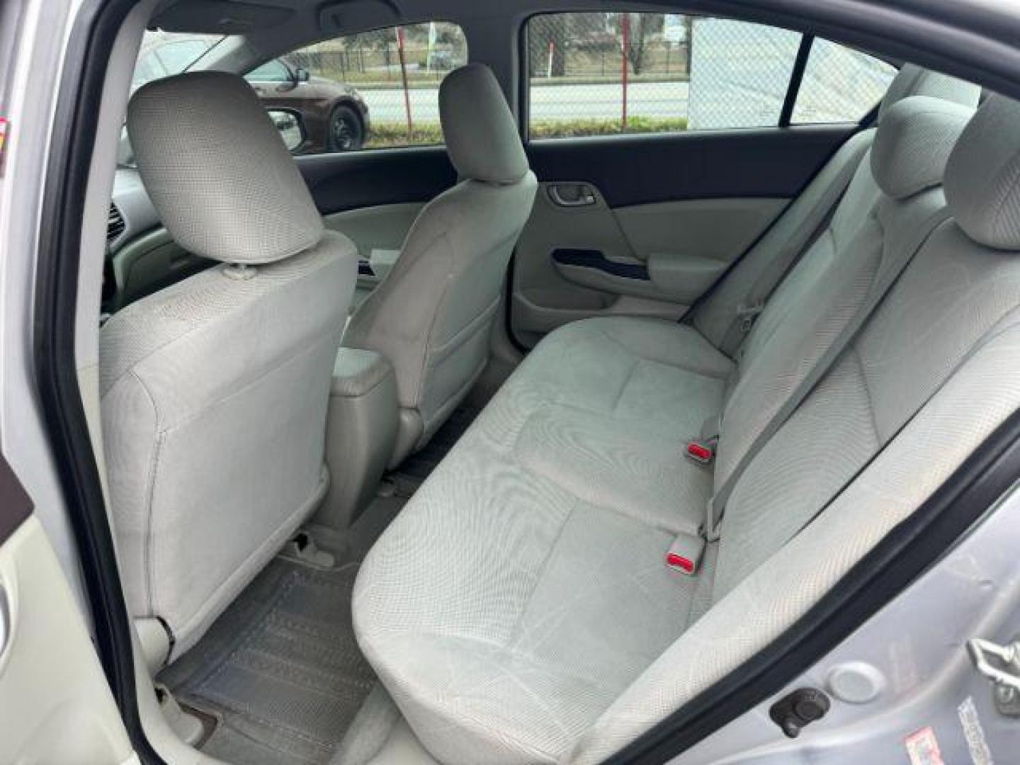 2012 Silver Honda Civic LX Sedan 5-Speed AT (2HGFB2F55CH) with an 1.8L L4 SOHC 16V engine, 5-Speed Automatic transmission, located at 1806 Veterans Memorial Hwy SW, Austell, GA, 30168, (770) 944-9558, 33.817959, -84.606987 - Photo#9