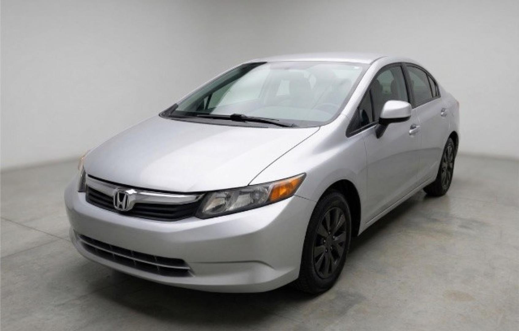 2012 Silver Honda Civic LX Sedan 5-Speed AT (2HGFB2F55CH) with an 1.8L L4 SOHC 16V engine, 5-Speed Automatic transmission, located at 1806 Veterans Memorial Hwy SW, Austell, GA, 30168, (770) 944-9558, 33.817959, -84.606987 - Photo#0