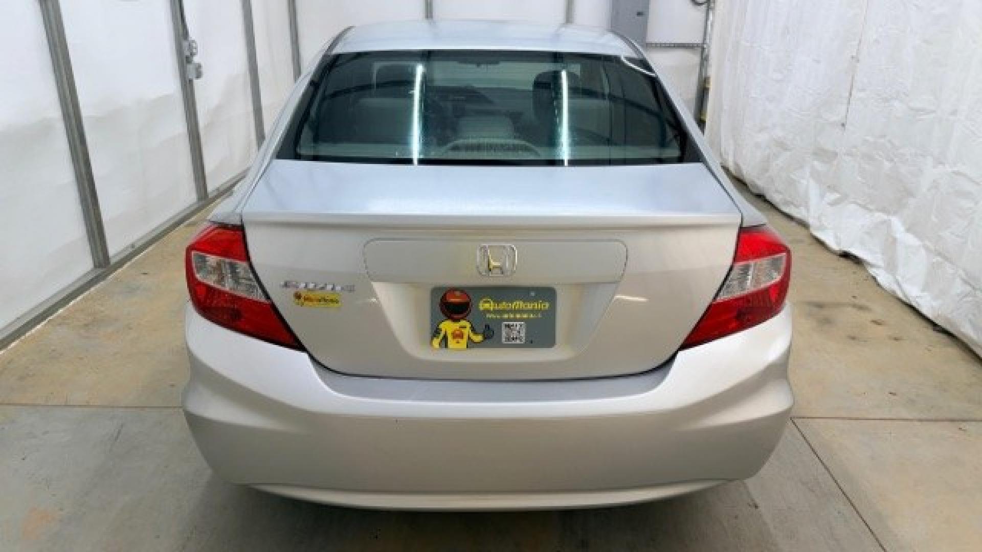 2012 Silver Honda Civic LX Sedan 5-Speed AT (2HGFB2F55CH) with an 1.8L L4 SOHC 16V engine, 5-Speed Automatic transmission, located at 1806 Veterans Memorial Hwy SW, Austell, GA, 30168, (770) 944-9558, 33.817959, -84.606987 - Photo#5