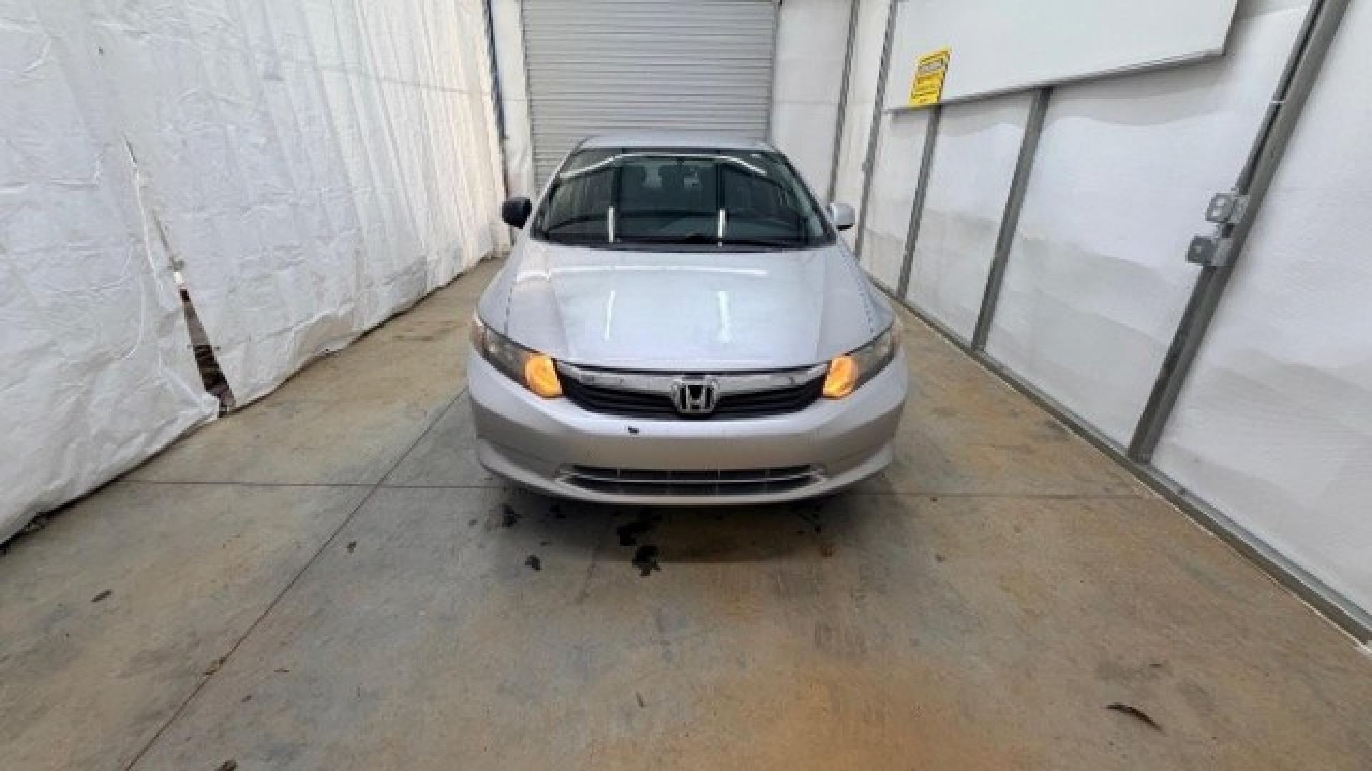 2012 Silver Honda Civic LX Sedan 5-Speed AT (2HGFB2F55CH) with an 1.8L L4 SOHC 16V engine, 5-Speed Automatic transmission, located at 1806 Veterans Memorial Hwy SW, Austell, GA, 30168, (770) 944-9558, 33.817959, -84.606987 - Photo#7