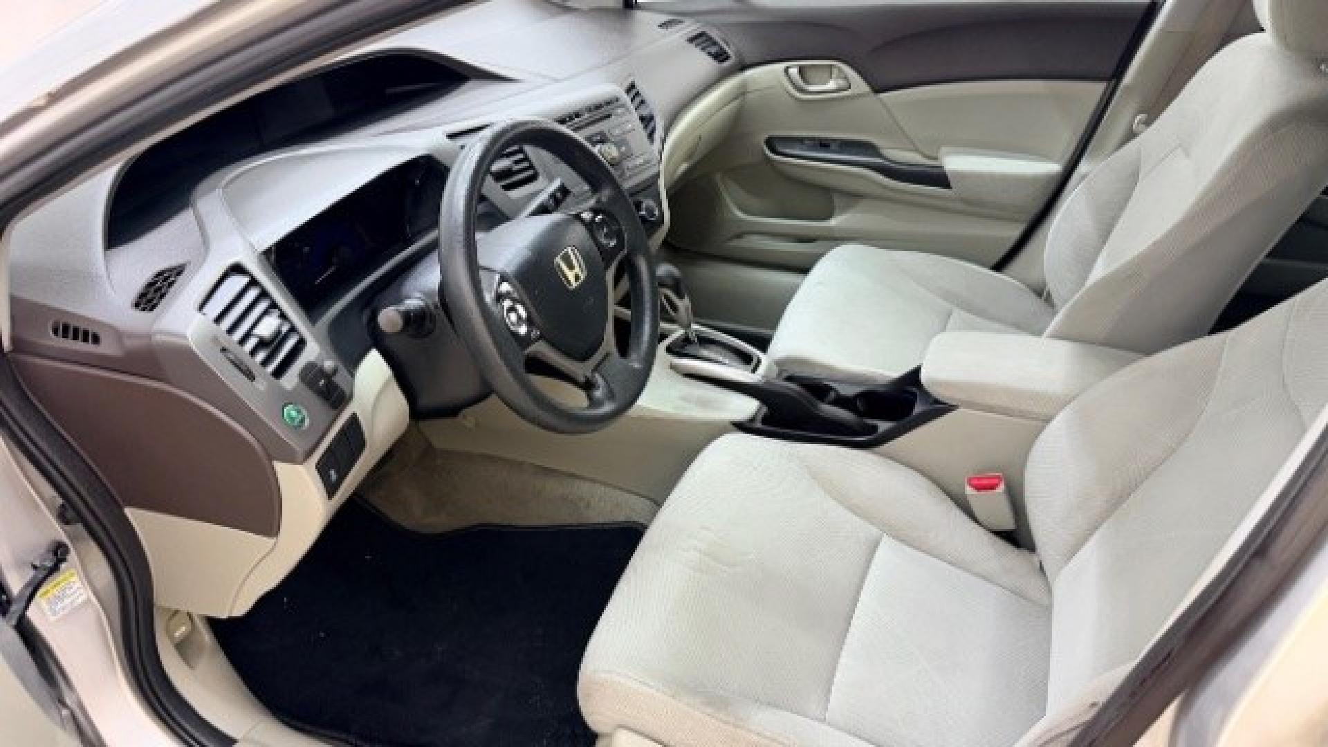 2012 Silver Honda Civic LX Sedan 5-Speed AT (2HGFB2F55CH) with an 1.8L L4 SOHC 16V engine, 5-Speed Automatic transmission, located at 1806 Veterans Memorial Hwy SW, Austell, GA, 30168, (770) 944-9558, 33.817959, -84.606987 - Photo#10