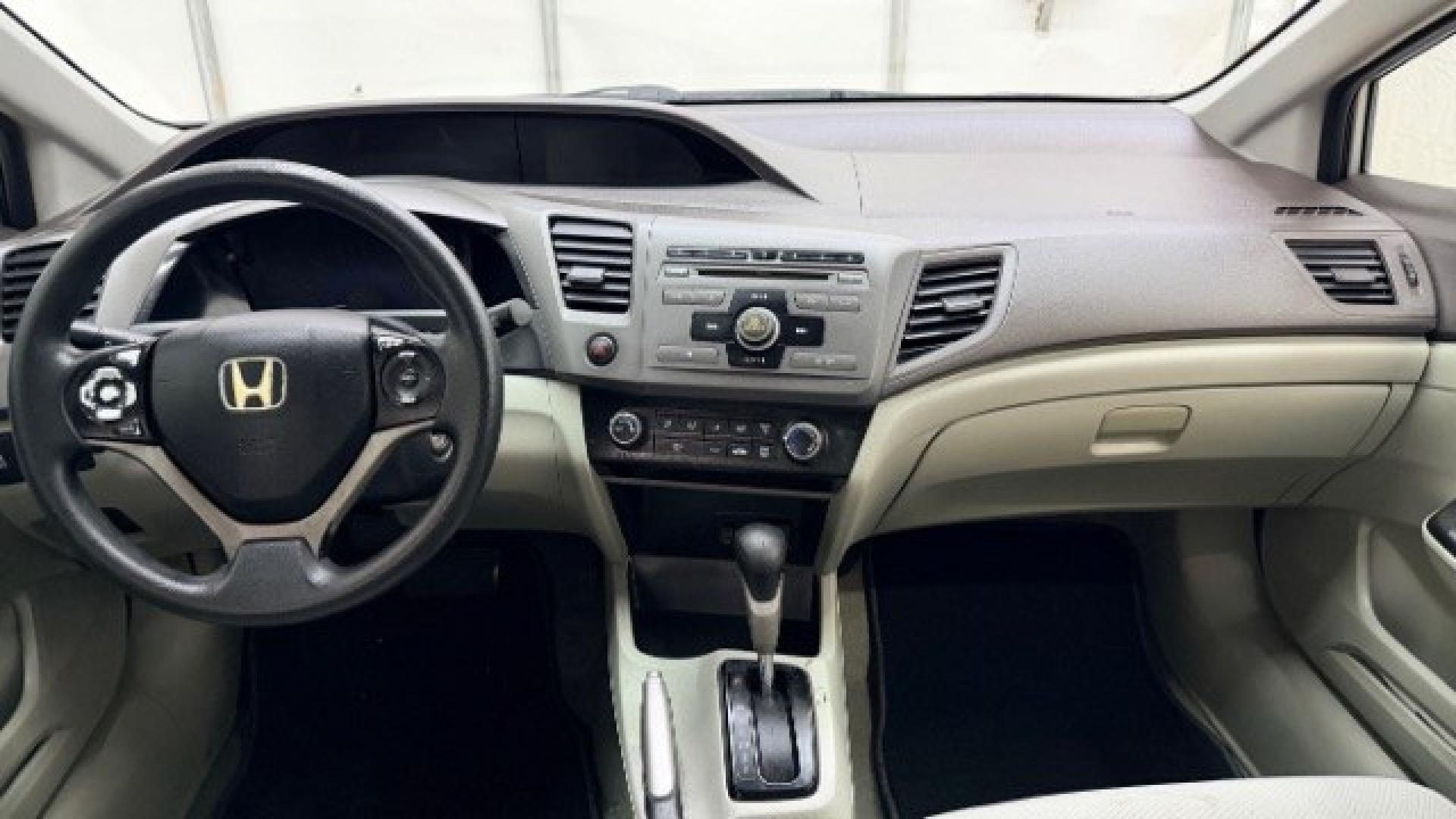 2012 Silver Honda Civic LX Sedan 5-Speed AT (2HGFB2F55CH) with an 1.8L L4 SOHC 16V engine, 5-Speed Automatic transmission, located at 1806 Veterans Memorial Hwy SW, Austell, GA, 30168, (770) 944-9558, 33.817959, -84.606987 - Photo#14