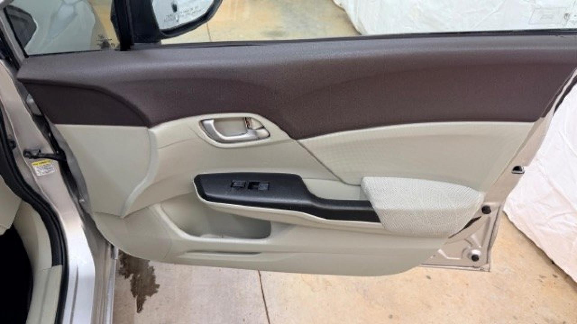 2012 Silver Honda Civic LX Sedan 5-Speed AT (2HGFB2F55CH) with an 1.8L L4 SOHC 16V engine, 5-Speed Automatic transmission, located at 1806 Veterans Memorial Hwy SW, Austell, GA, 30168, (770) 944-9558, 33.817959, -84.606987 - Photo#17