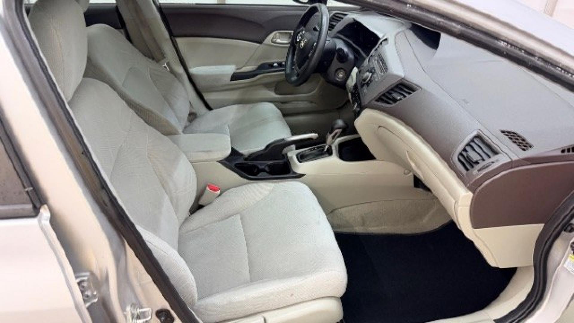 2012 Silver Honda Civic LX Sedan 5-Speed AT (2HGFB2F55CH) with an 1.8L L4 SOHC 16V engine, 5-Speed Automatic transmission, located at 1806 Veterans Memorial Hwy SW, Austell, GA, 30168, (770) 944-9558, 33.817959, -84.606987 - Photo#18