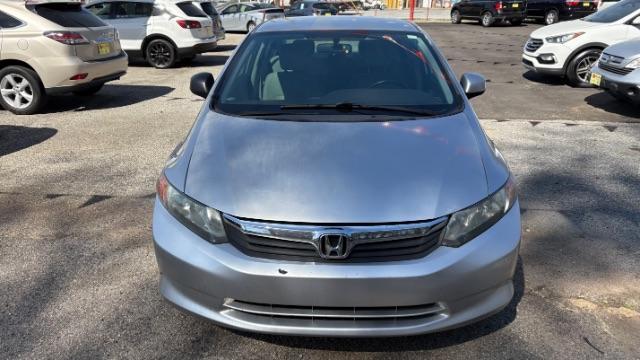 2012 Silver Honda Civic LX Sedan 5-Speed AT (2HGFB2F55CH) with an 1.8L L4 SOHC 16V engine, 5-Speed Automatic transmission, located at 1806 Veterans Memorial Hwy SW, Austell, GA, 30168, (770) 944-9558, 33.817959, -84.606987 - Photo#1