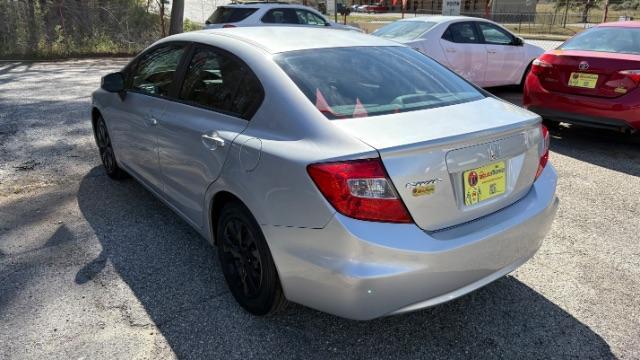 2012 Silver Honda Civic LX Sedan 5-Speed AT (2HGFB2F55CH) with an 1.8L L4 SOHC 16V engine, 5-Speed Automatic transmission, located at 1806 Veterans Memorial Hwy SW, Austell, GA, 30168, (770) 944-9558, 33.817959, -84.606987 - Photo#5