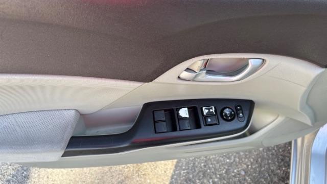 2012 Silver Honda Civic LX Sedan 5-Speed AT (2HGFB2F55CH) with an 1.8L L4 SOHC 16V engine, 5-Speed Automatic transmission, located at 1806 Veterans Memorial Hwy SW, Austell, GA, 30168, (770) 944-9558, 33.817959, -84.606987 - Photo#9