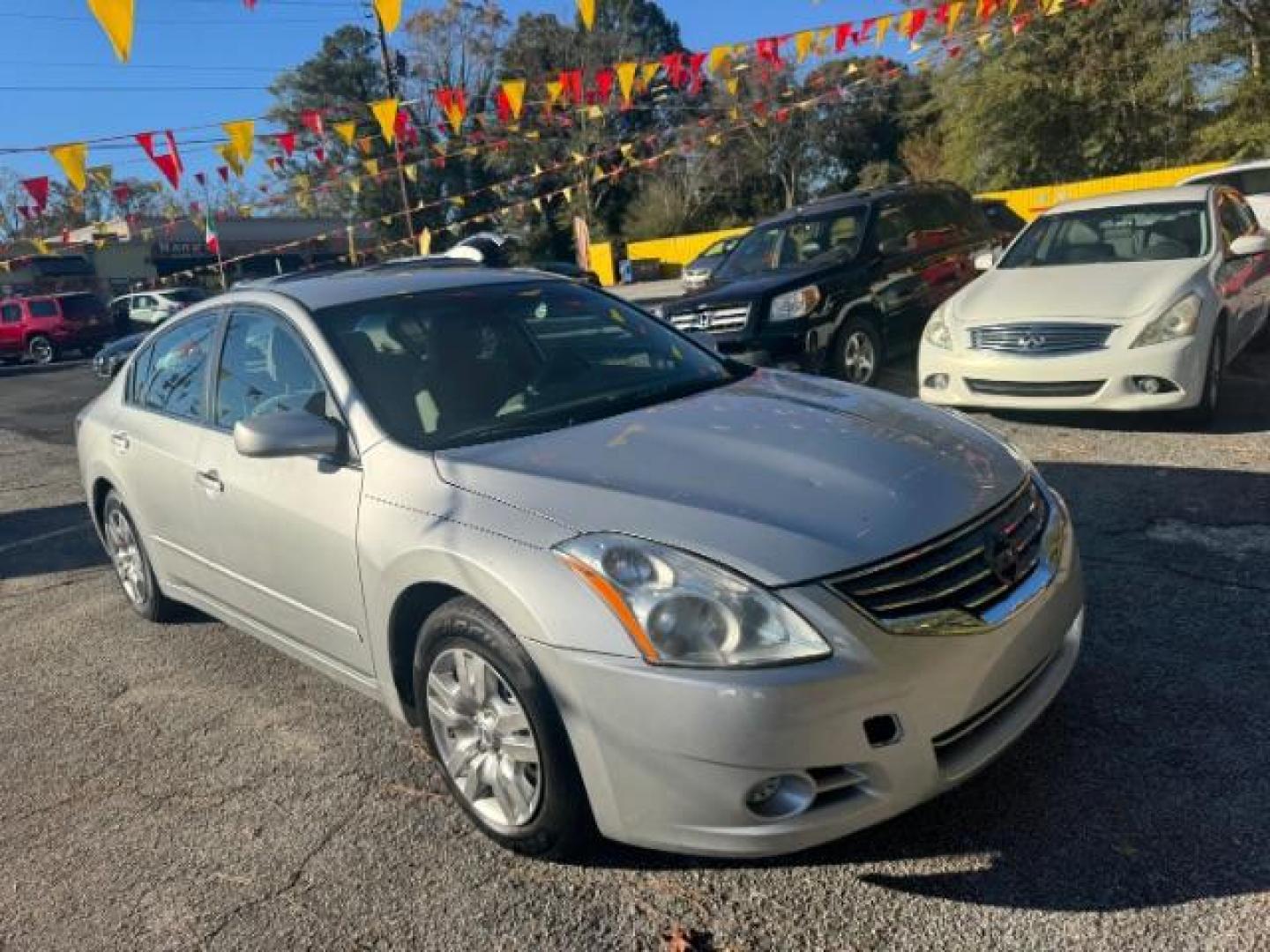 2011 Silver Nissan Altima 2.5 (1N4AL2AP4BC) with an 2.5L L4 DOHC 16V engine, Automatic transmission, located at 1806 Veterans Memorial Hwy SW, Austell, GA, 30168, (770) 944-9558, 33.817959, -84.606987 - Photo#2