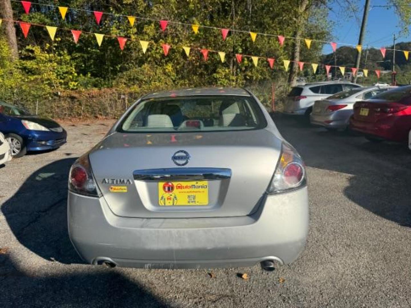 2011 Silver Nissan Altima 2.5 (1N4AL2AP4BC) with an 2.5L L4 DOHC 16V engine, Automatic transmission, located at 1806 Veterans Memorial Hwy SW, Austell, GA, 30168, (770) 944-9558, 33.817959, -84.606987 - Photo#4