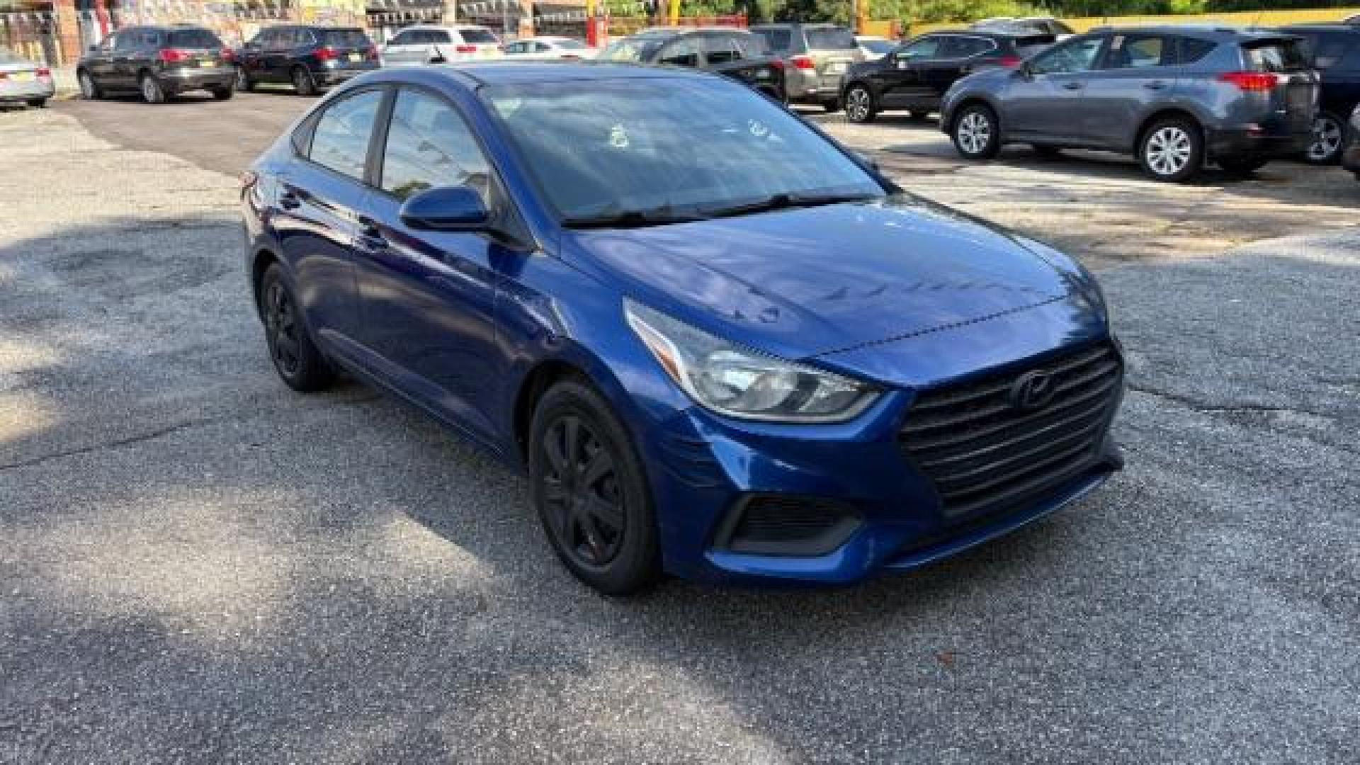 2018 Blue Hyundai Accent SE 4-Door 6A (3KPC24A32JE) with an 1.6L L4 DOHC 16V engine, 6-Speed Automatic transmission, located at 1806 Veterans Memorial Hwy SW, Austell, GA, 30168, (770) 944-9558, 33.817959, -84.606987 - Photo#2