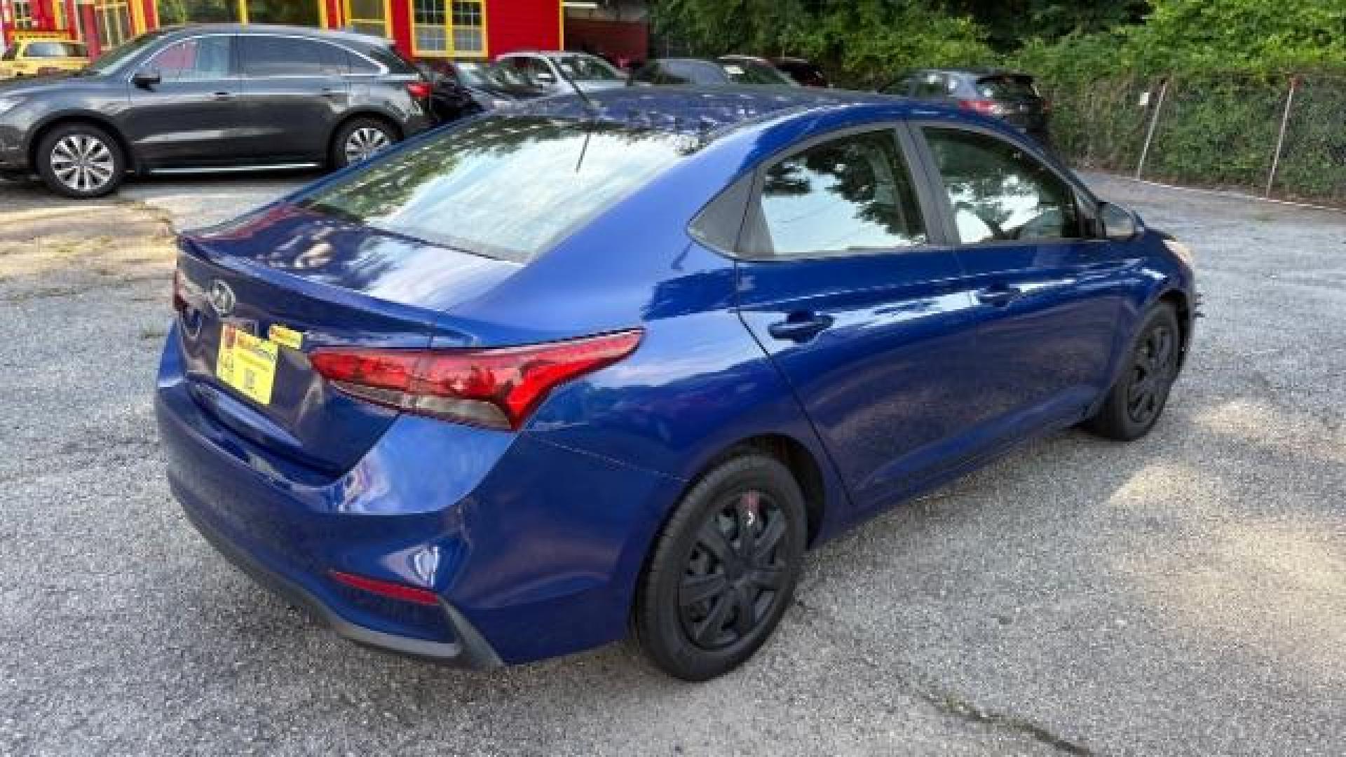 2018 Blue Hyundai Accent SE 4-Door 6A (3KPC24A32JE) with an 1.6L L4 DOHC 16V engine, 6-Speed Automatic transmission, located at 1806 Veterans Memorial Hwy SW, Austell, GA, 30168, (770) 944-9558, 33.817959, -84.606987 - Photo#3