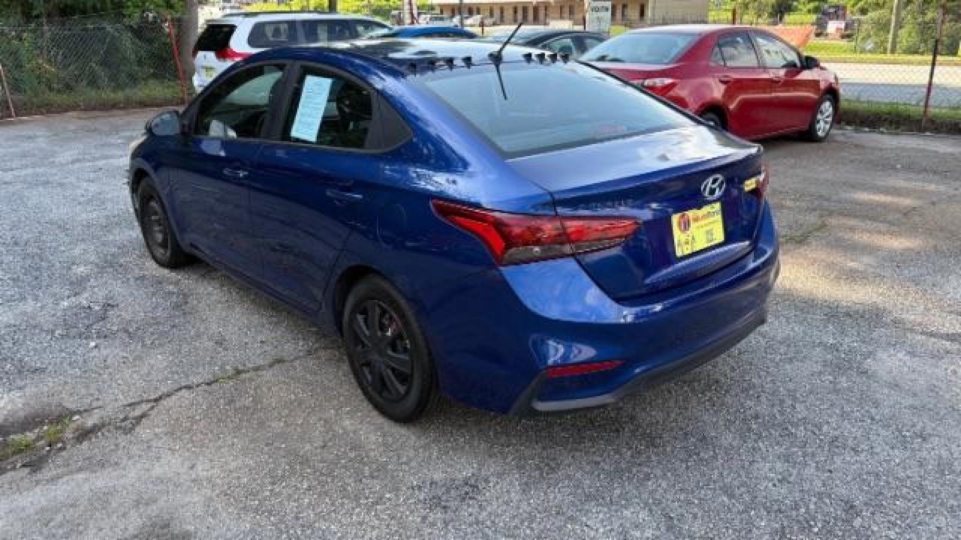 2018 Blue Hyundai Accent SE 4-Door 6A (3KPC24A32JE) with an 1.6L L4 DOHC 16V engine, 6-Speed Automatic transmission, located at 1806 Veterans Memorial Hwy SW, Austell, GA, 30168, (770) 944-9558, 33.817959, -84.606987 - Photo#4