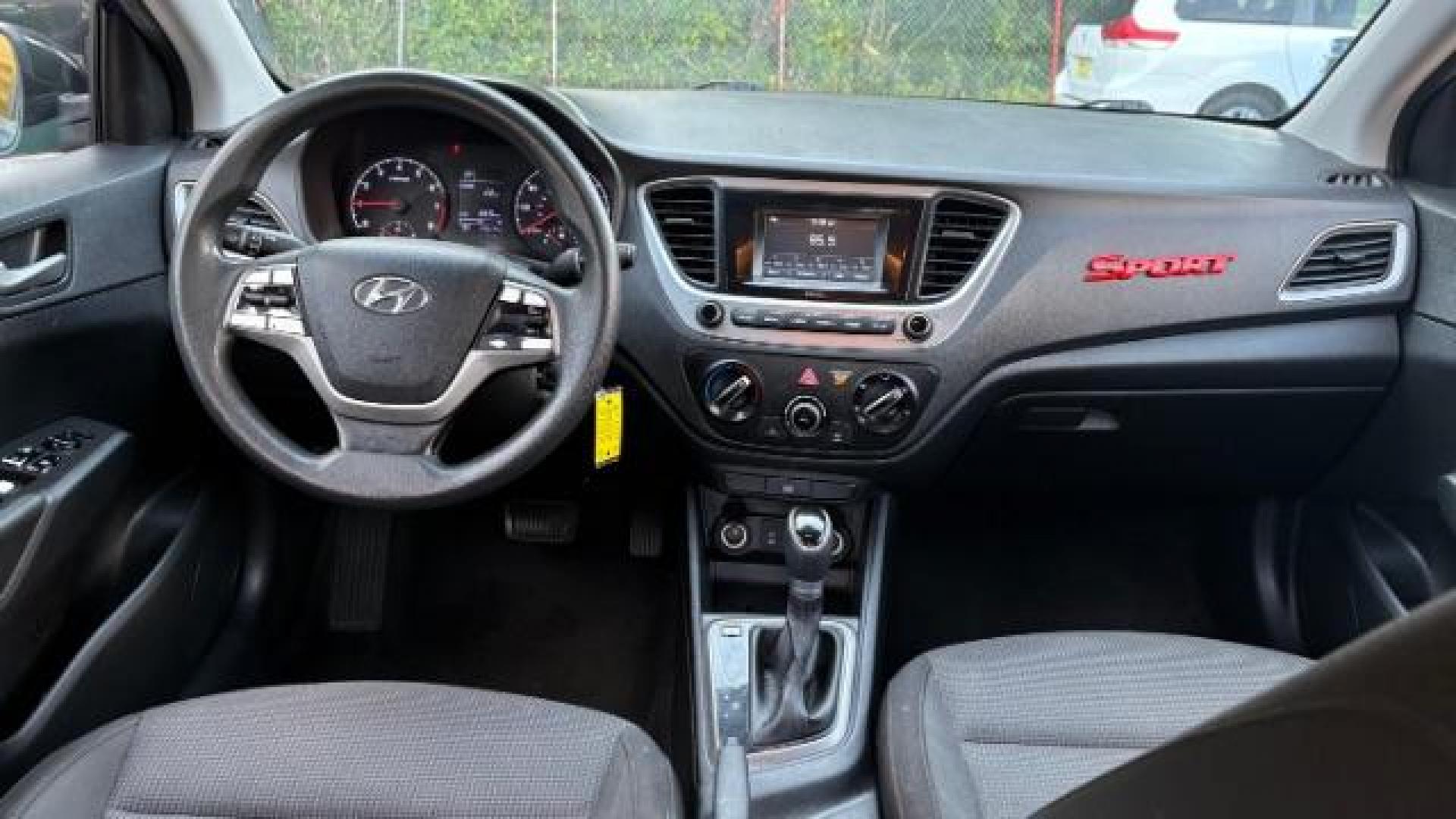 2018 Blue Hyundai Accent SE 4-Door 6A (3KPC24A32JE) with an 1.6L L4 DOHC 16V engine, 6-Speed Automatic transmission, located at 1806 Veterans Memorial Hwy SW, Austell, GA, 30168, (770) 944-9558, 33.817959, -84.606987 - Photo#7