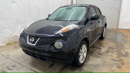 2014 Black Nissan Juke S FWD (JN8AF5MRXET) with an 1.6L L4 DOHC 16V TURBO engine, Continuously Variable Transmission transmission, located at 1806 Veterans Memorial Hwy SW, Austell, GA, 30168, (770) 944-9558, 33.817959, -84.606987 - Photo#0