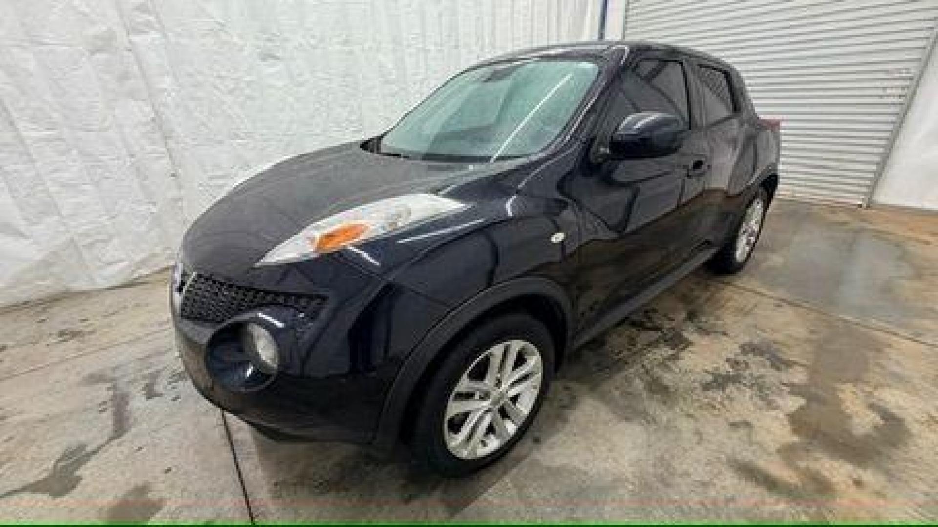 2014 Black Nissan Juke S FWD (JN8AF5MRXET) with an 1.6L L4 DOHC 16V TURBO engine, Continuously Variable Transmission transmission, located at 1806 Veterans Memorial Hwy SW, Austell, GA, 30168, (770) 944-9558, 33.817959, -84.606987 - Photo#1