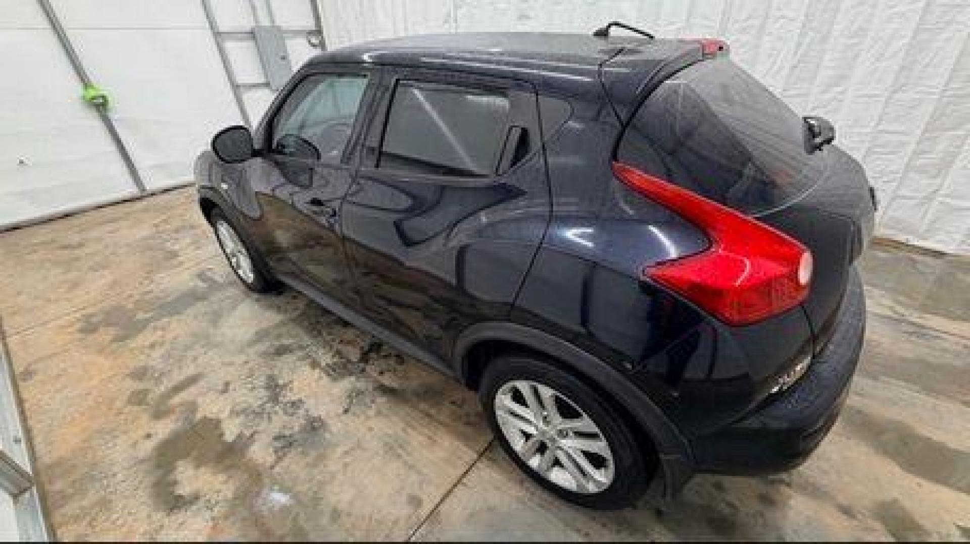 2014 Black Nissan Juke S FWD (JN8AF5MRXET) with an 1.6L L4 DOHC 16V TURBO engine, Continuously Variable Transmission transmission, located at 1806 Veterans Memorial Hwy SW, Austell, GA, 30168, (770) 944-9558, 33.817959, -84.606987 - Photo#2