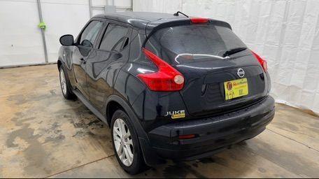 2014 Black Nissan Juke S FWD (JN8AF5MRXET) with an 1.6L L4 DOHC 16V TURBO engine, Continuously Variable Transmission transmission, located at 1806 Veterans Memorial Hwy SW, Austell, GA, 30168, (770) 944-9558, 33.817959, -84.606987 - Photo#3