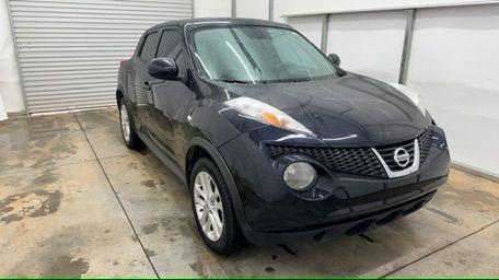 2014 Black Nissan Juke S FWD (JN8AF5MRXET) with an 1.6L L4 DOHC 16V TURBO engine, Continuously Variable Transmission transmission, located at 1806 Veterans Memorial Hwy SW, Austell, GA, 30168, (770) 944-9558, 33.817959, -84.606987 - Photo#7