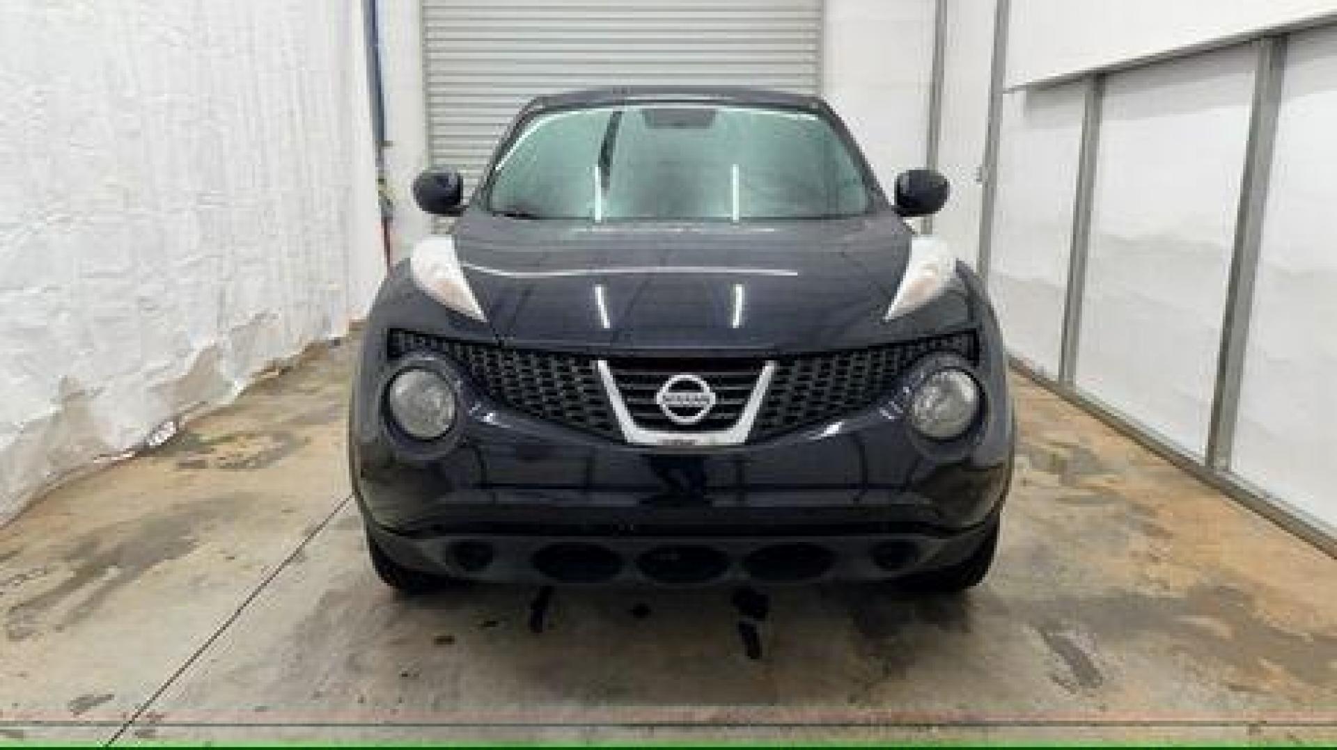 2014 Black Nissan Juke S FWD (JN8AF5MRXET) with an 1.6L L4 DOHC 16V TURBO engine, Continuously Variable Transmission transmission, located at 1806 Veterans Memorial Hwy SW, Austell, GA, 30168, (770) 944-9558, 33.817959, -84.606987 - Photo#8