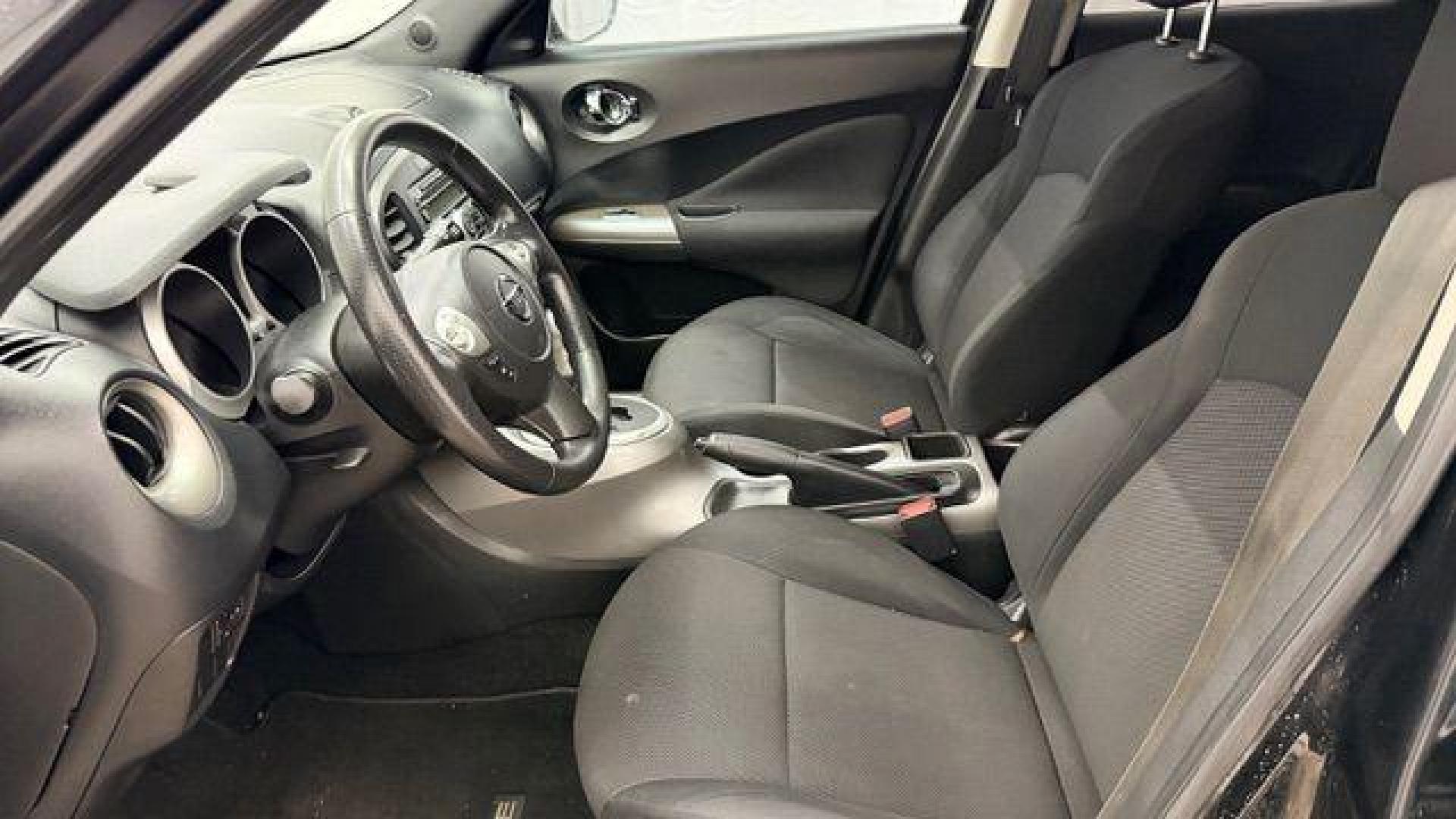 2014 Black Nissan Juke S FWD (JN8AF5MRXET) with an 1.6L L4 DOHC 16V TURBO engine, Continuously Variable Transmission transmission, located at 1806 Veterans Memorial Hwy SW, Austell, GA, 30168, (770) 944-9558, 33.817959, -84.606987 - Photo#11