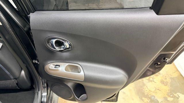 2014 Black Nissan Juke S FWD (JN8AF5MRXET) with an 1.6L L4 DOHC 16V TURBO engine, Continuously Variable Transmission transmission, located at 1806 Veterans Memorial Hwy SW, Austell, GA, 30168, (770) 944-9558, 33.817959, -84.606987 - Photo#16