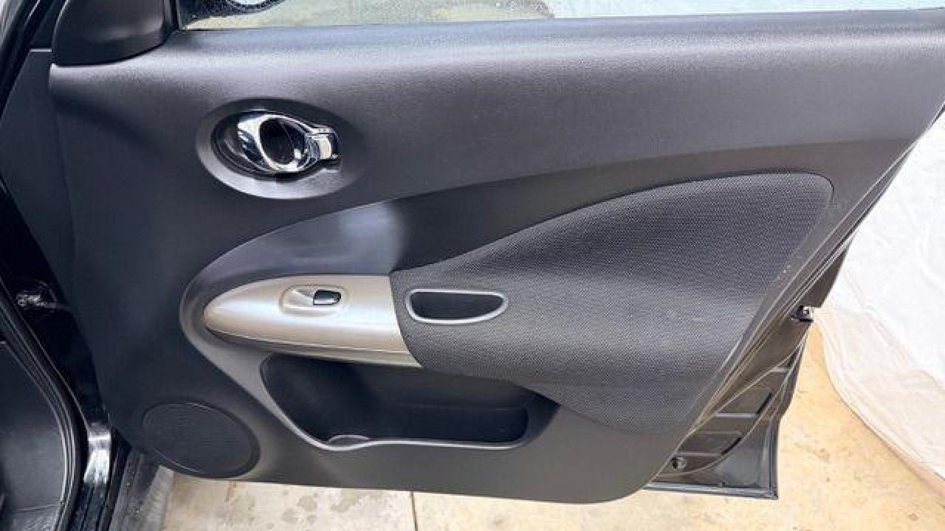 2014 Black Nissan Juke S FWD (JN8AF5MRXET) with an 1.6L L4 DOHC 16V TURBO engine, Continuously Variable Transmission transmission, located at 1806 Veterans Memorial Hwy SW, Austell, GA, 30168, (770) 944-9558, 33.817959, -84.606987 - Photo#19