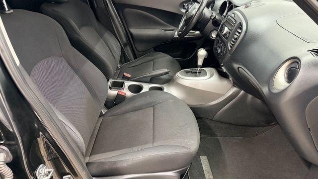 2014 Black Nissan Juke S FWD (JN8AF5MRXET) with an 1.6L L4 DOHC 16V TURBO engine, Continuously Variable Transmission transmission, located at 1806 Veterans Memorial Hwy SW, Austell, GA, 30168, (770) 944-9558, 33.817959, -84.606987 - Photo#21