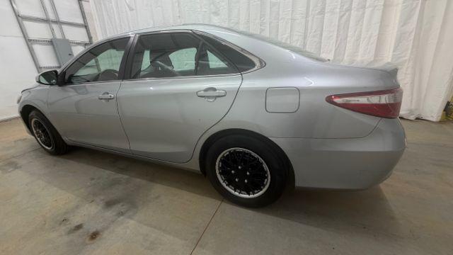 2017 Silver Toyota Camry LE (4T1BF1FK0HU) with an 2.5L L4 DOHC 16V engine, 6-Speed Automatic transmission, located at 1806 Veterans Memorial Hwy SW, Austell, GA, 30168, (770) 944-9558, 33.817959, -84.606987- Photo#2