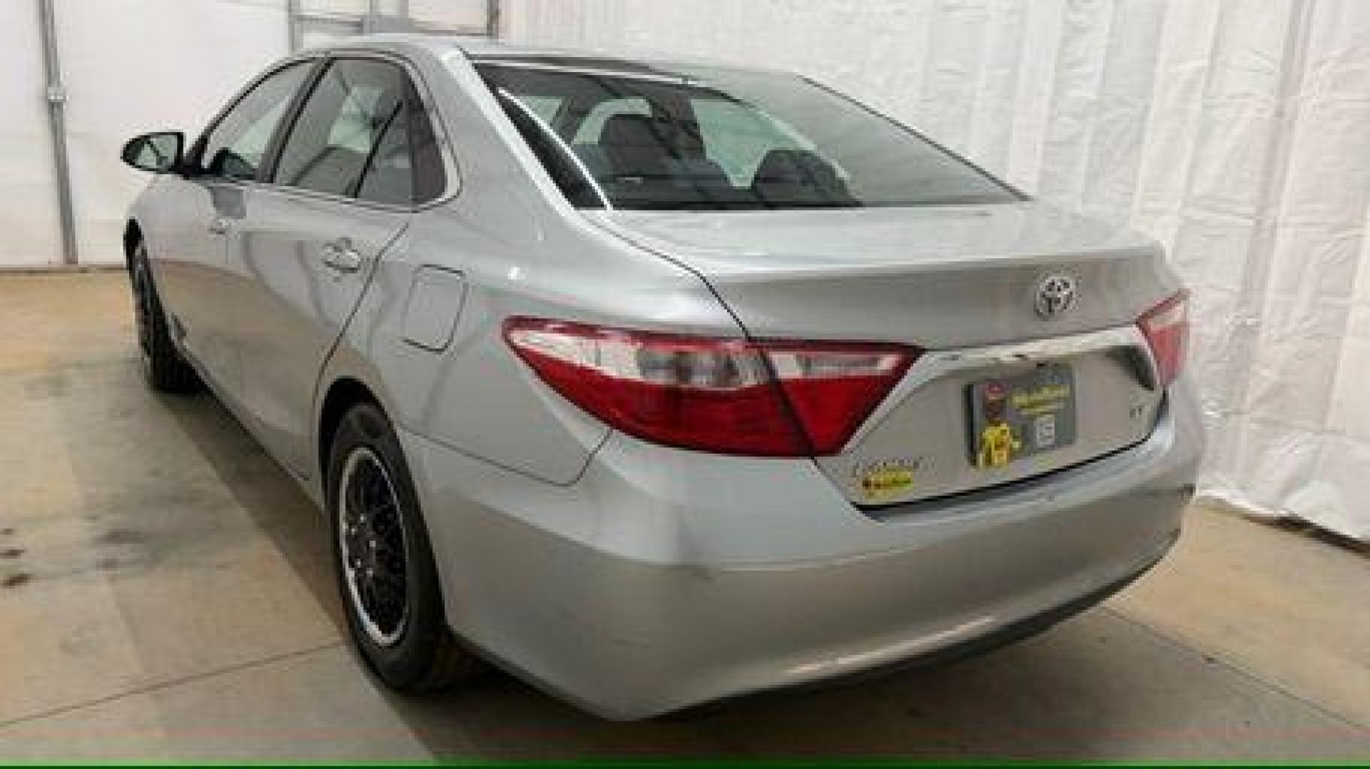2017 Silver Toyota Camry LE (4T1BF1FK0HU) with an 2.5L L4 DOHC 16V engine, 6-Speed Automatic transmission, located at 1806 Veterans Memorial Hwy SW, Austell, GA, 30168, (770) 944-9558, 33.817959, -84.606987 - Photo#3