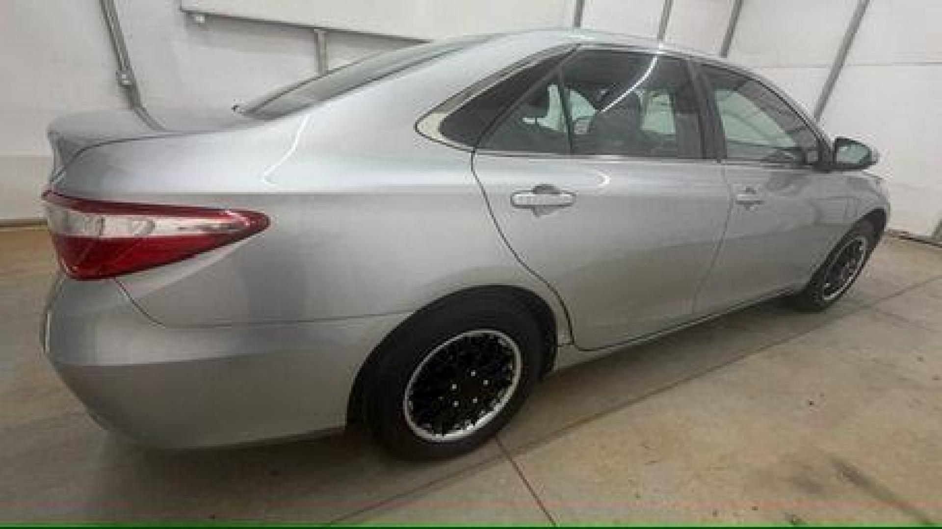 2017 Silver Toyota Camry LE (4T1BF1FK0HU) with an 2.5L L4 DOHC 16V engine, 6-Speed Automatic transmission, located at 1806 Veterans Memorial Hwy SW, Austell, GA, 30168, (770) 944-9558, 33.817959, -84.606987 - Photo#6