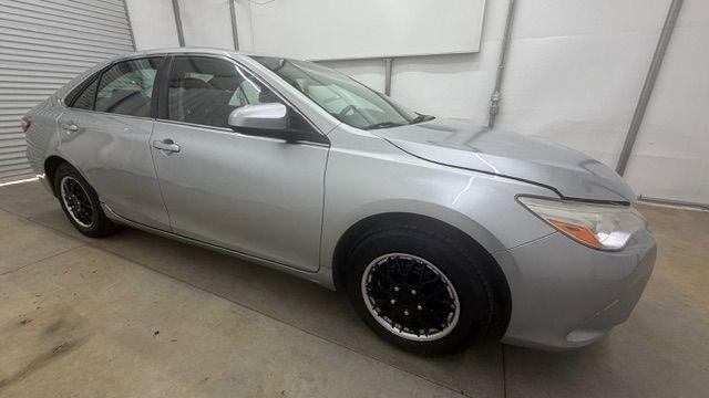 2017 Silver Toyota Camry LE (4T1BF1FK0HU) with an 2.5L L4 DOHC 16V engine, 6-Speed Automatic transmission, located at 1806 Veterans Memorial Hwy SW, Austell, GA, 30168, (770) 944-9558, 33.817959, -84.606987- Photo#7