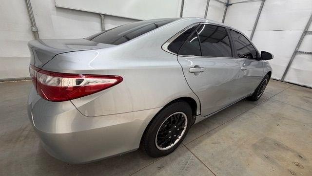 2017 Silver Toyota Camry LE (4T1BF1FK0HU) with an 2.5L L4 DOHC 16V engine, 6-Speed Automatic transmission, located at 1806 Veterans Memorial Hwy SW, Austell, GA, 30168, (770) 944-9558, 33.817959, -84.606987- Photo#6