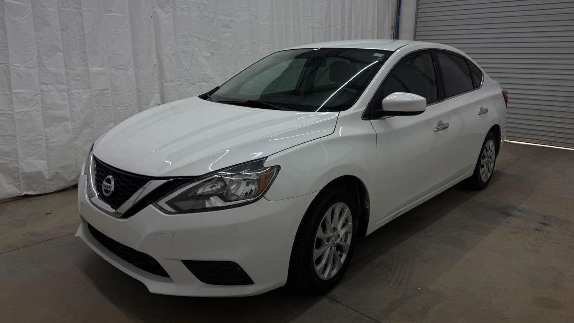 2018 White Nissan Sentra S CVT (3N1AB7AP5JL) with an 1.8L L4 SFI DOHC 16 engine, Continuously Variabl transmission, located at 1806 Veterans Memorial Hwy SW, Austell, GA, 30168, (770) 944-9558, 33.817959, -84.606987 - Photo#1