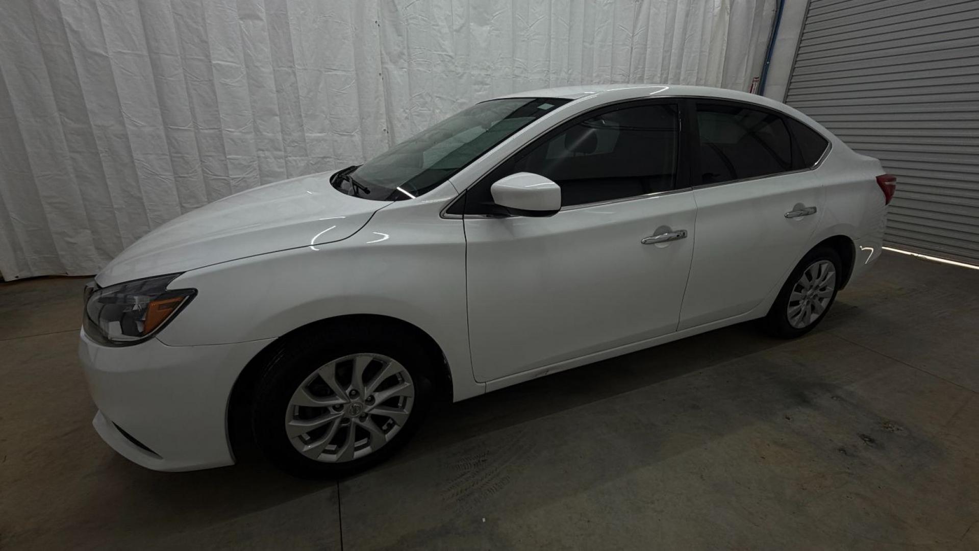 2018 White Nissan Sentra S CVT (3N1AB7AP5JL) with an 1.8L L4 SFI DOHC 16 engine, Continuously Variabl transmission, located at 1806 Veterans Memorial Hwy SW, Austell, GA, 30168, (770) 944-9558, 33.817959, -84.606987 - Photo#2